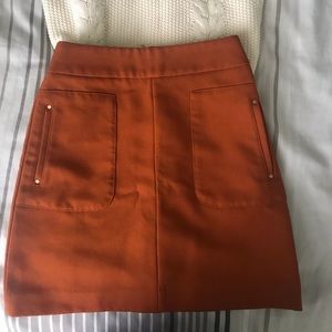 H&M mini skirt size 2, burnt-orange color
